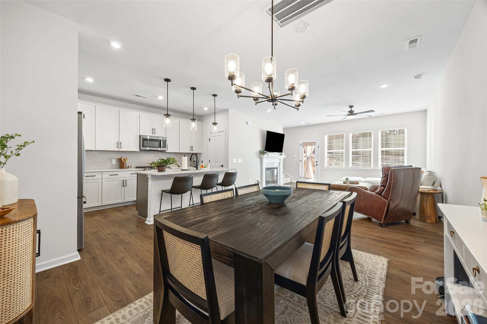285 Brooks Springs Drive Fort Mill, SC 29708 - Photo 8 of 28 a view of a dining room with furniture window and wooden floor
