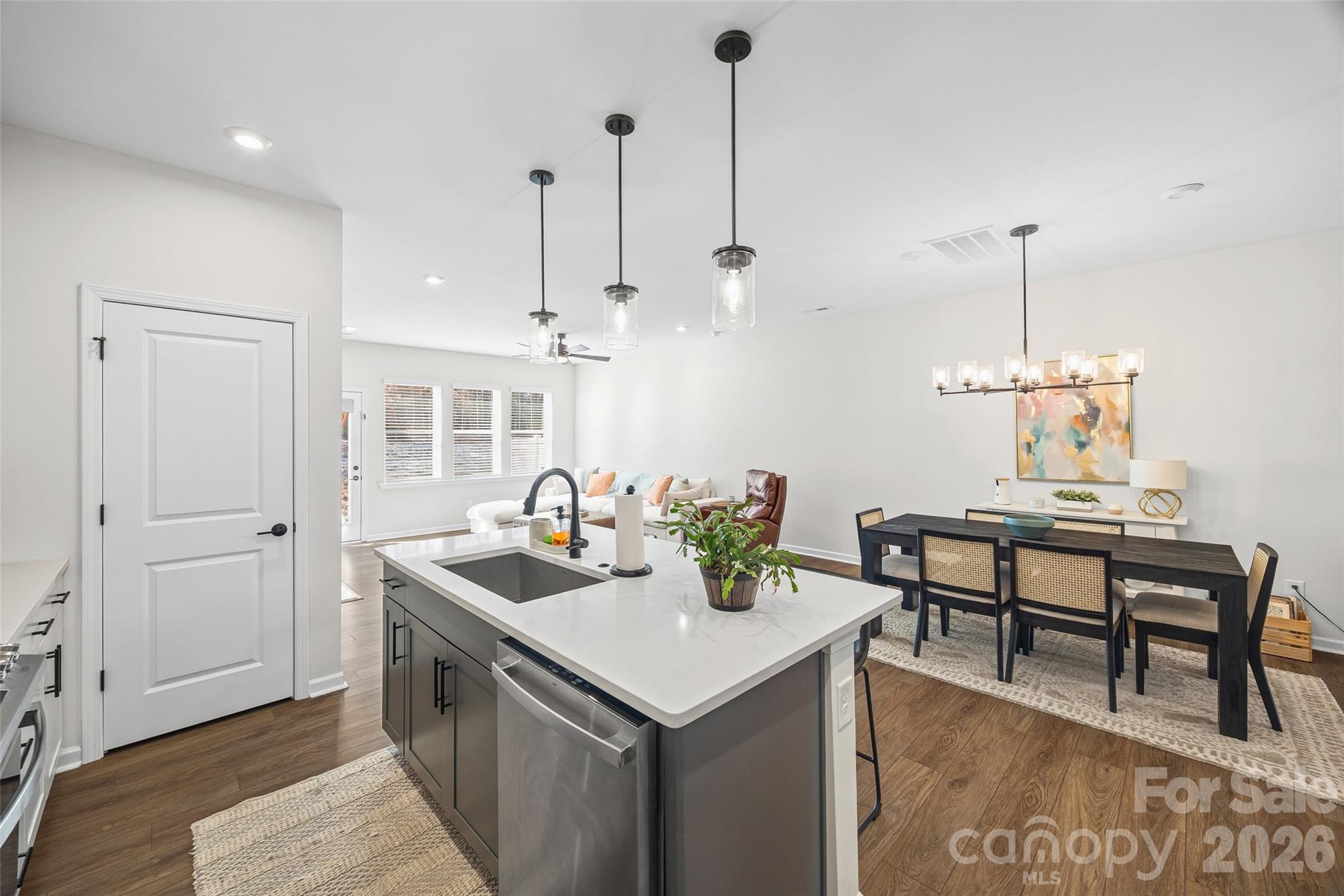 285 Brooks Springs Drive Fort Mill, SC 29708 - Photo 9 of 28 a kitchen that has a sink a table and chairs in it
