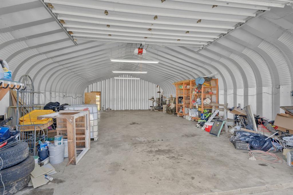 319 Hawk Ridge Decatur, TX 76234 - Photo 23 of 38 a view of a garage with an table and chairs