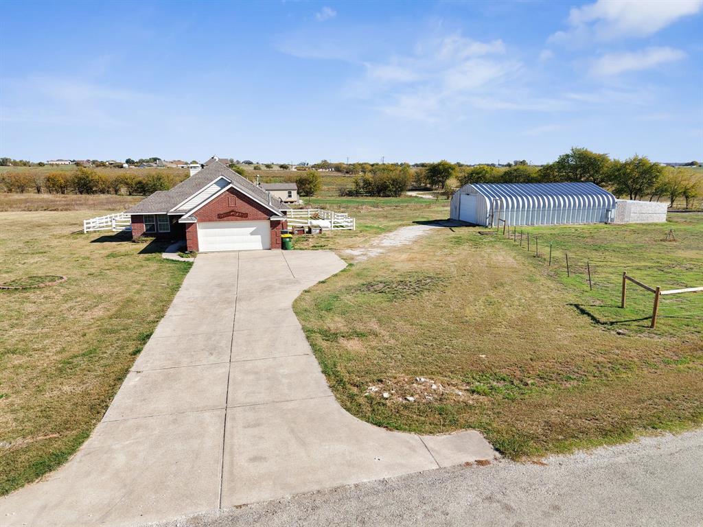 319 Hawk Ridge Decatur, TX 76234 - Photo 4 of 38 a view of a house with outdoor space