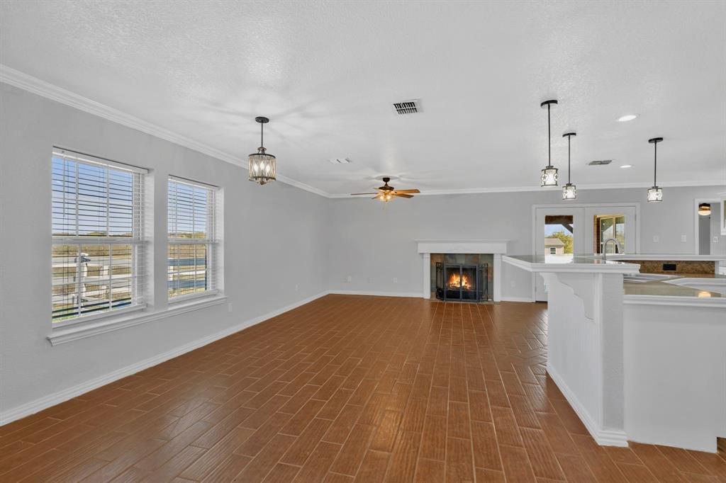 319 Hawk Ridge Decatur, TX 76234 - Photo 7 of 38 a living room with furniture and a fireplace