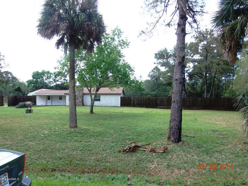 3915 Grant Line Road Mims, FL 32754 - Photo 2 of 17 Front and Fence