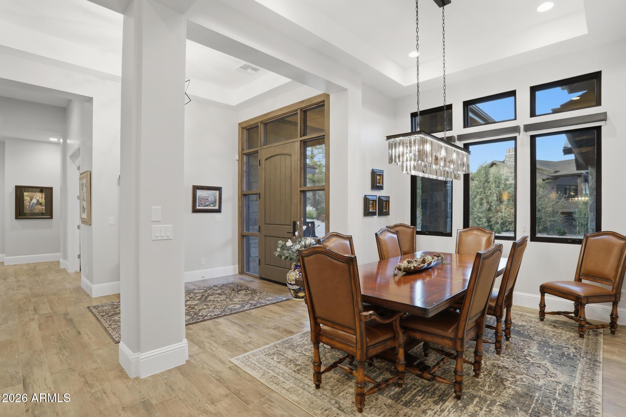 2207 East Filaree Circle Payson, AZ 85541 - Photo 11 of 38 a view of a dining room with furniture window and wooden floor
