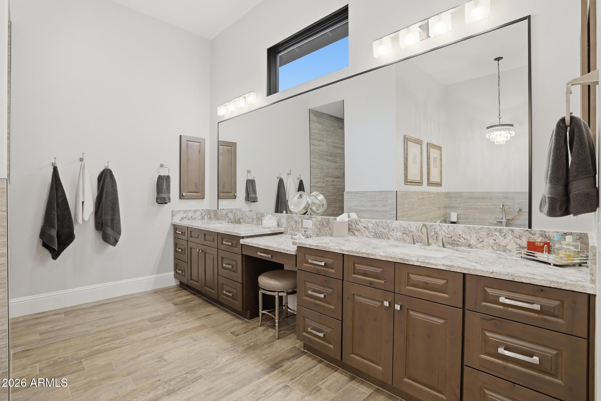 2207 East Filaree Circle Payson, AZ 85541 - Photo 14 of 38 a bathroom with a double vanity sink and a mirror