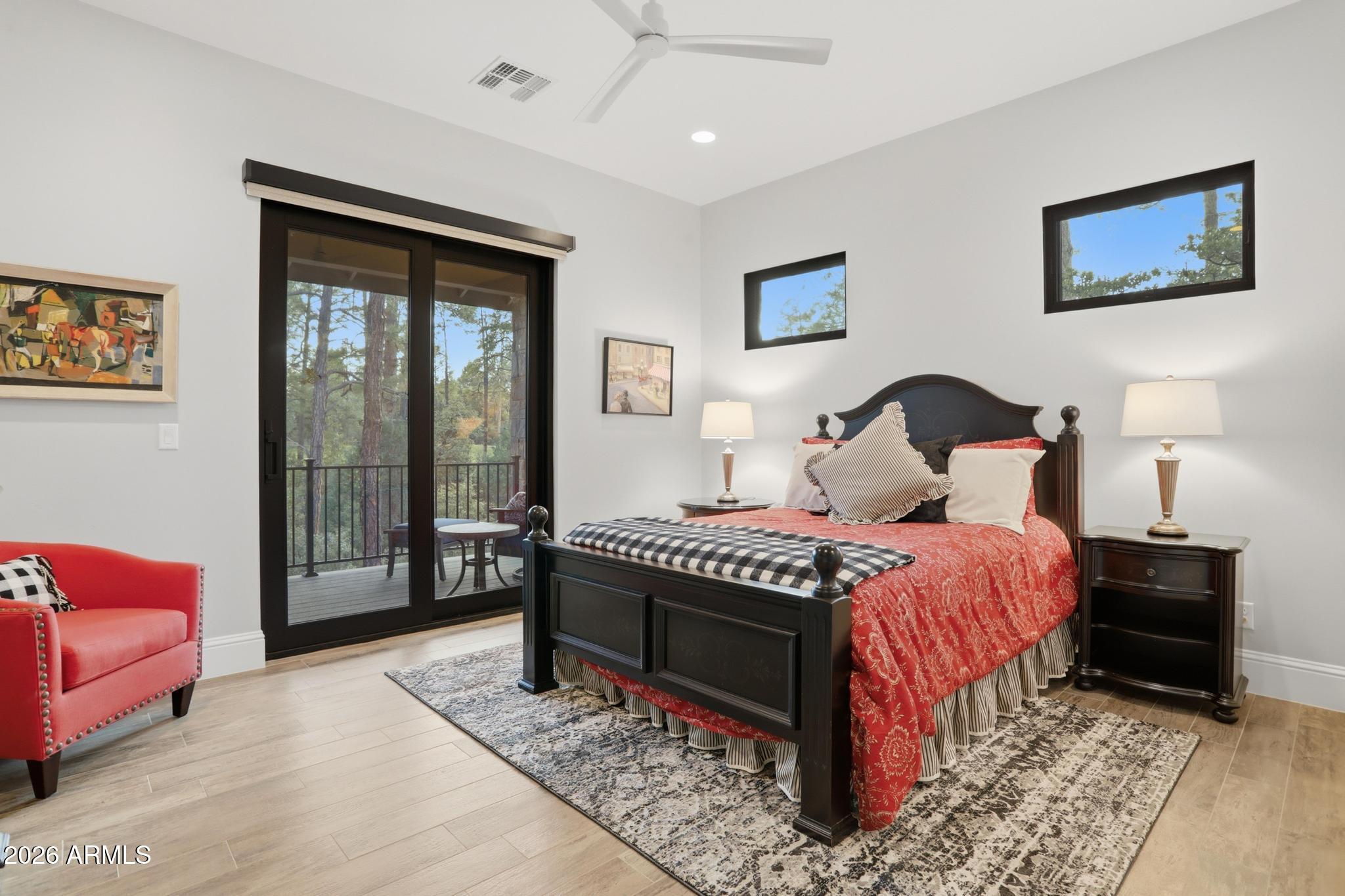 2207 East Filaree Circle Payson, AZ 85541 - Photo 18 of 38 a bedroom with a bed and glass walk in closet