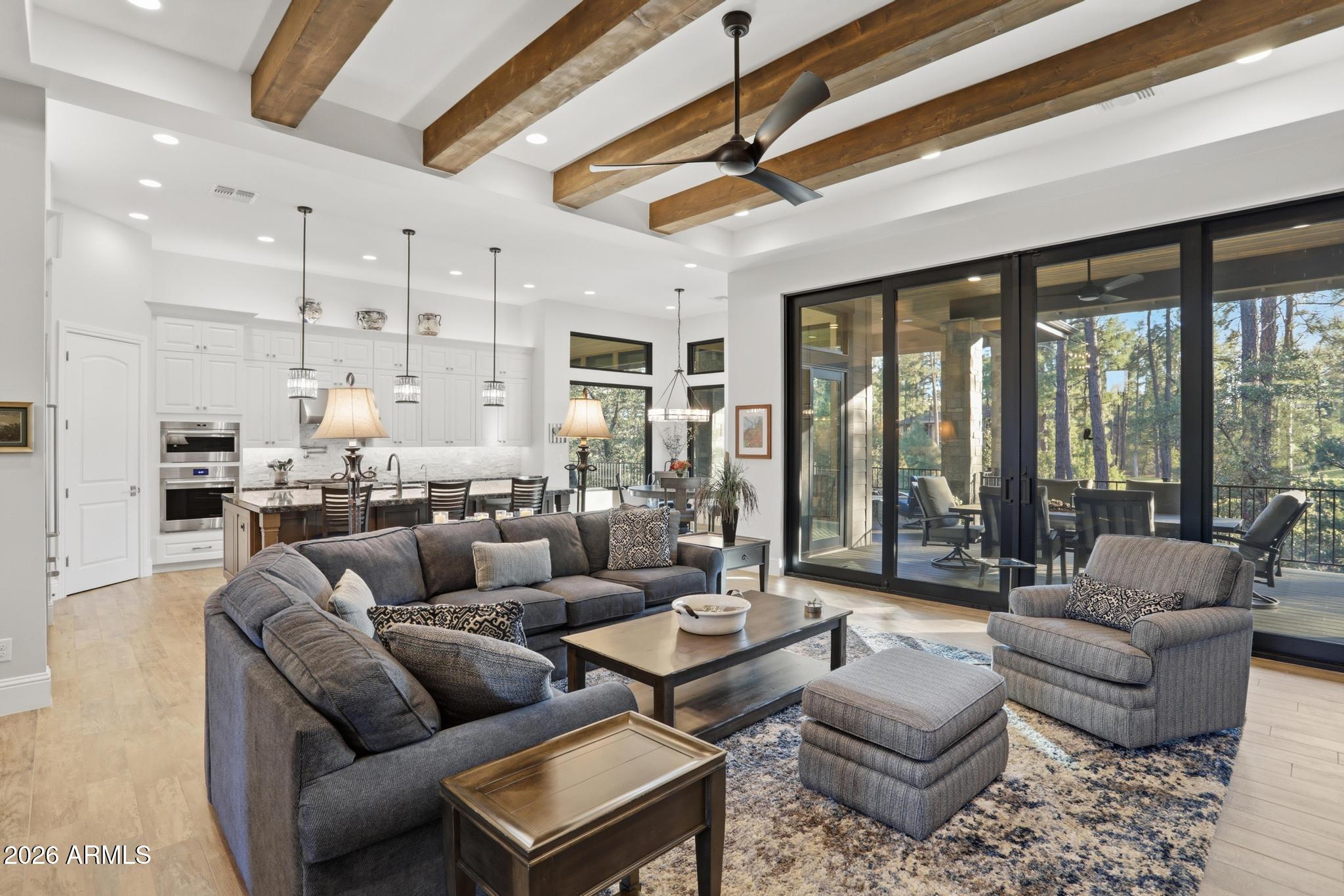 2207 East Filaree Circle Payson, AZ 85541 - Photo 2 of 38 a living room with furniture and a large window
