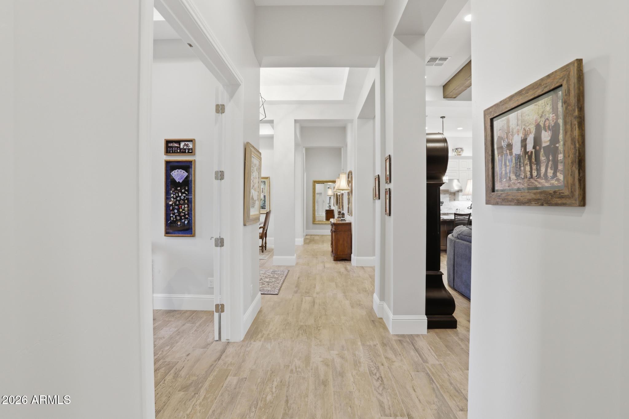 2207 East Filaree Circle Payson, AZ 85541 - Photo 26 of 38 a view of a hallway with wooden floor and entryway