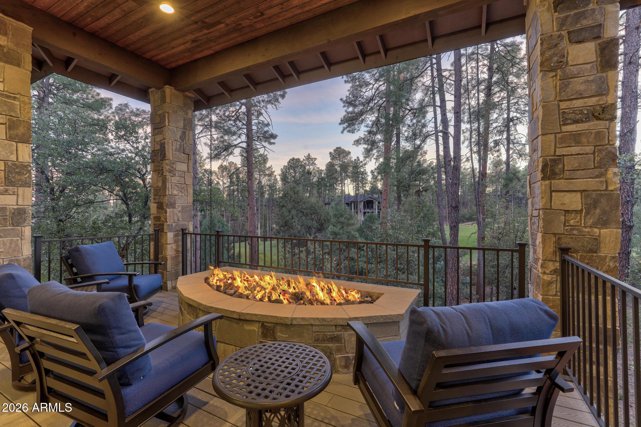 2207 East Filaree Circle Payson, AZ 85541 - Photo 32 of 38 a outdoor sitting area with furniture and wooden floor