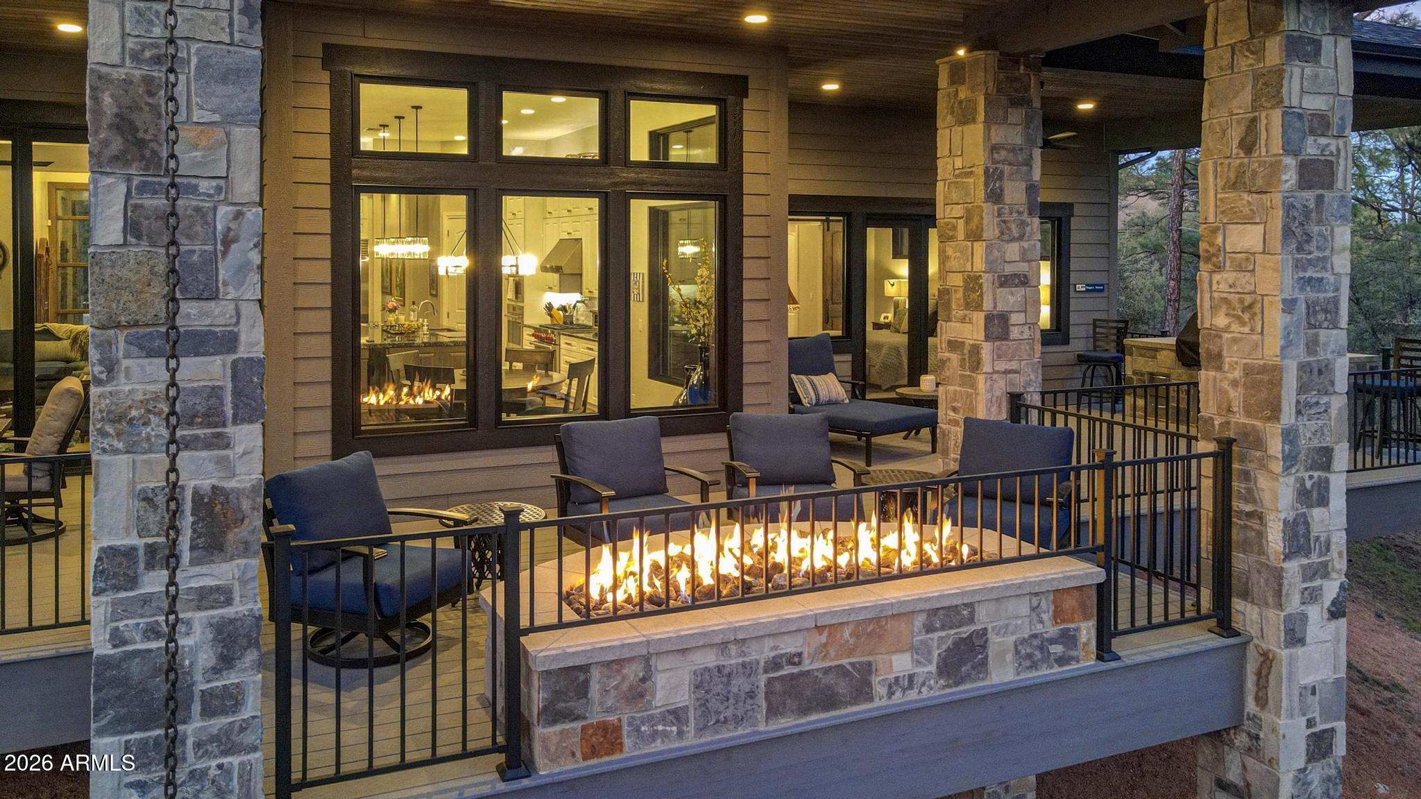 2207 East Filaree Circle Payson, AZ 85541 - Photo 34 of 38 a living room with furniture and a floor to ceiling window