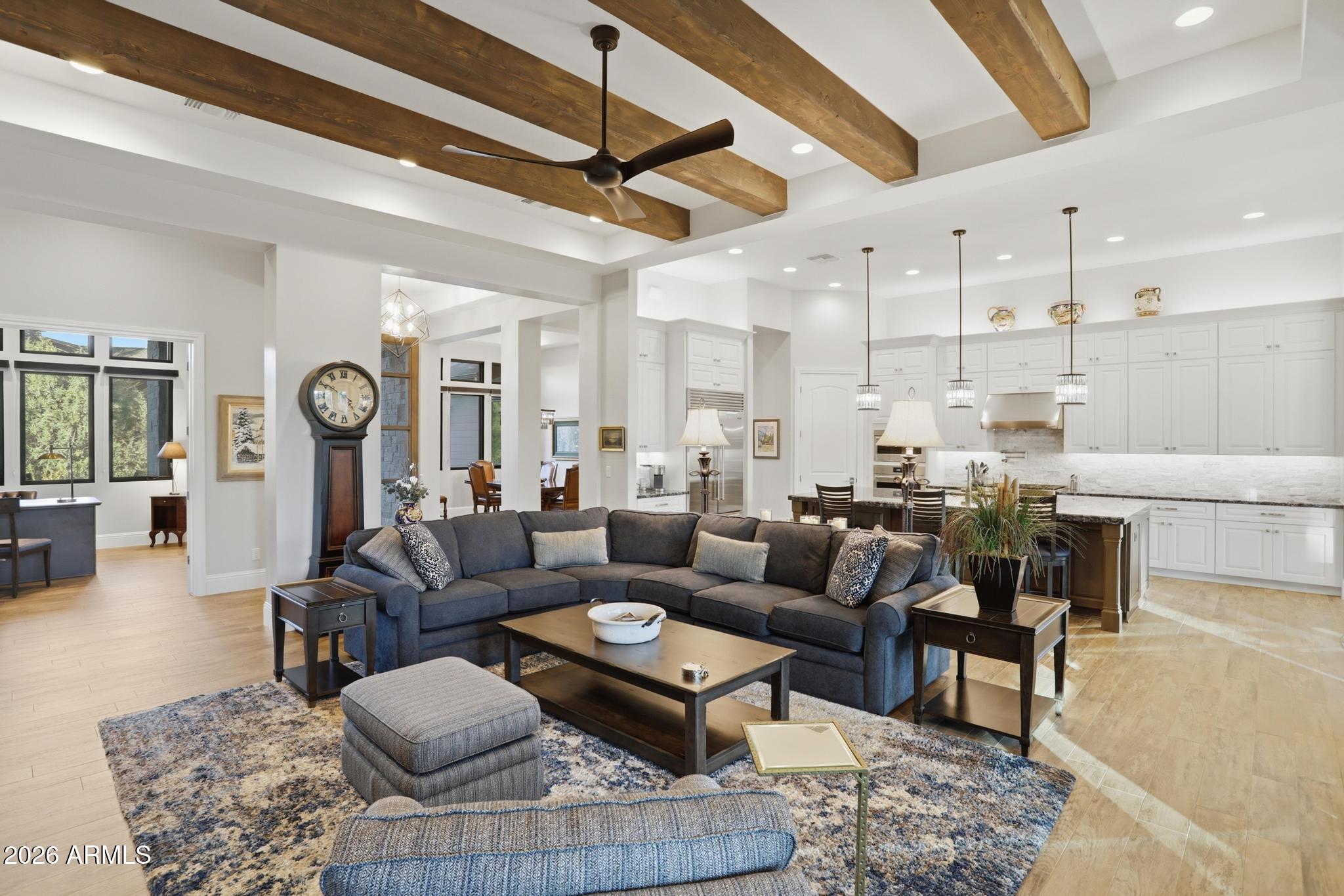 2207 East Filaree Circle Payson, AZ 85541 - Photo 5 of 38 a living room with furniture kitchen view and a chandelier