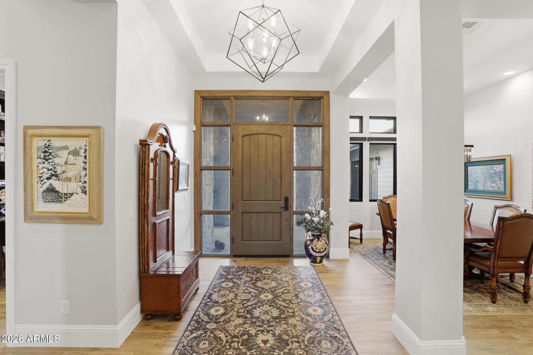 2207 East Filaree Circle Payson, AZ 85541 - Photo 10 of 38 a view of a hallway with wooden floor and windows