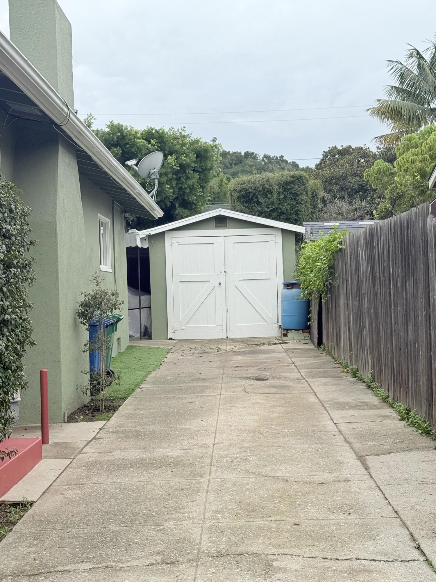 1411 Gillespie Street Santa Barbara, CA 93101 - Photo 25 of 26 a view of a small house with wooden fence