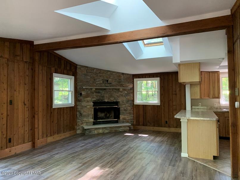 150 Ridge Road Pocono Lake, PA 18347 - Photo 3 of 10 Living room/dining room