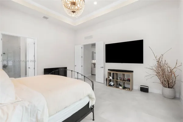a bathroom with a shower sink and mirror