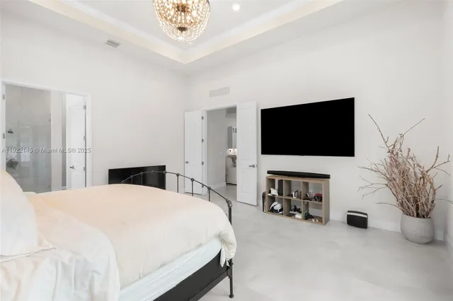 a bathroom with a tub and a shower