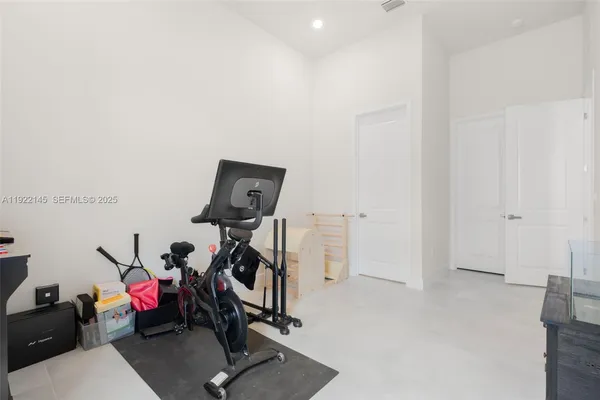 a view of a room with gym equipment