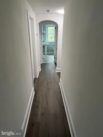 a view of a bathroom from the hallway