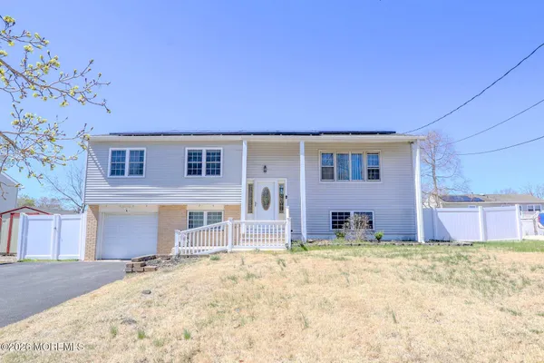 a house view with a outdoor space
