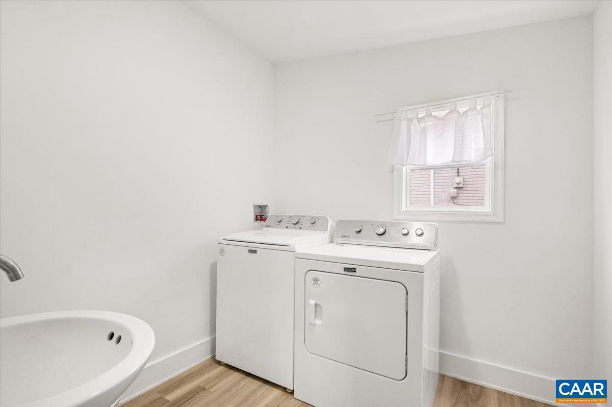 662 Celt Road Stanardsville, VA 22973 - Photo 21 of 22 a utility room with dryer and washer