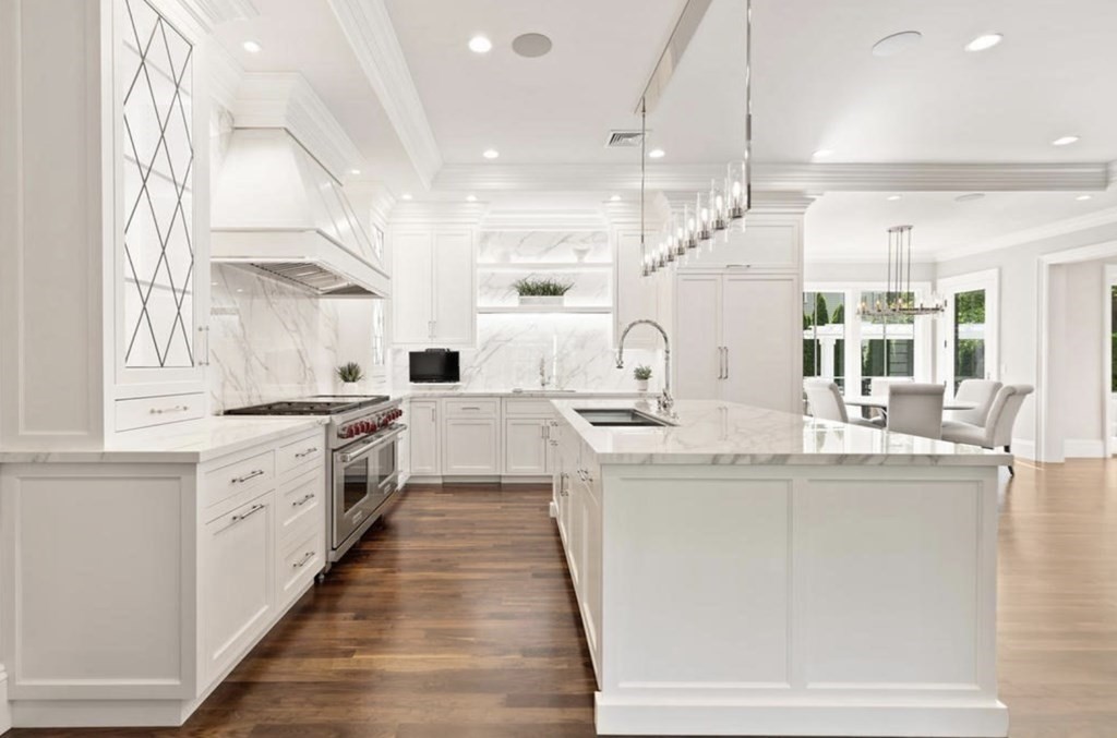 34 Philip Road Lexington, MA 02421 - Photo 2 of 7 a large white kitchen with a large window