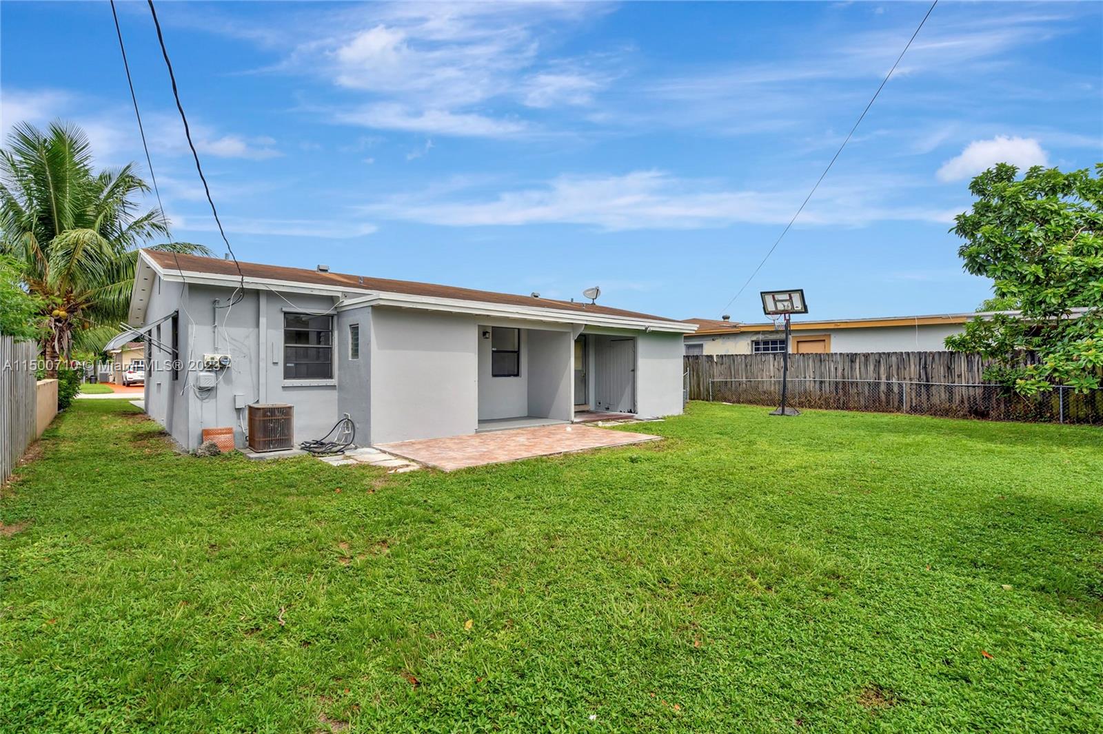 6126 Southwest 19th Street, Unit E Miramar, FL 33023 - Photo 18 of 26 a view of a house with a backyard