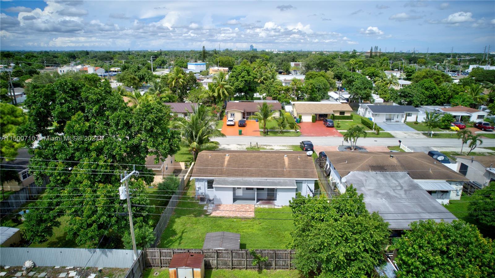 6126 Southwest 19th Street, Unit E Miramar, FL 33023 - Photo 23 of 26 an aerial view of a house with a garden and lake view