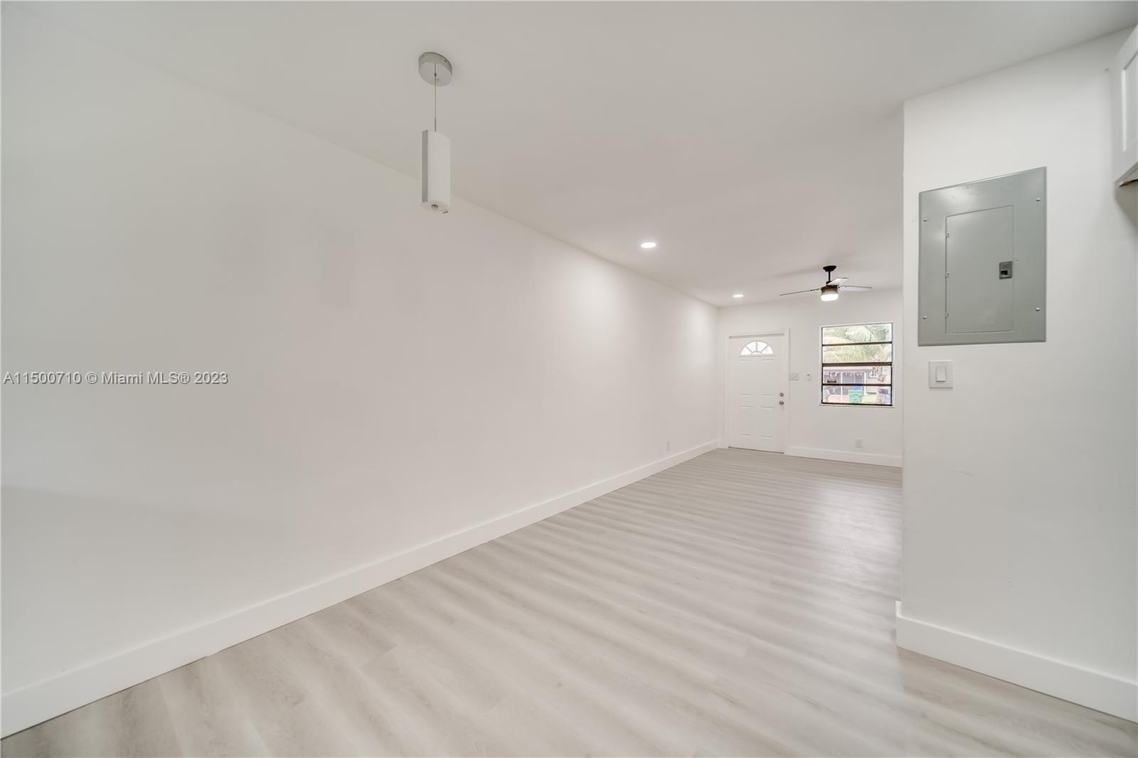 6126 Southwest 19th Street, Unit E Miramar, FL 33023 - Photo 8 of 26 a view of a refrigerator in a room