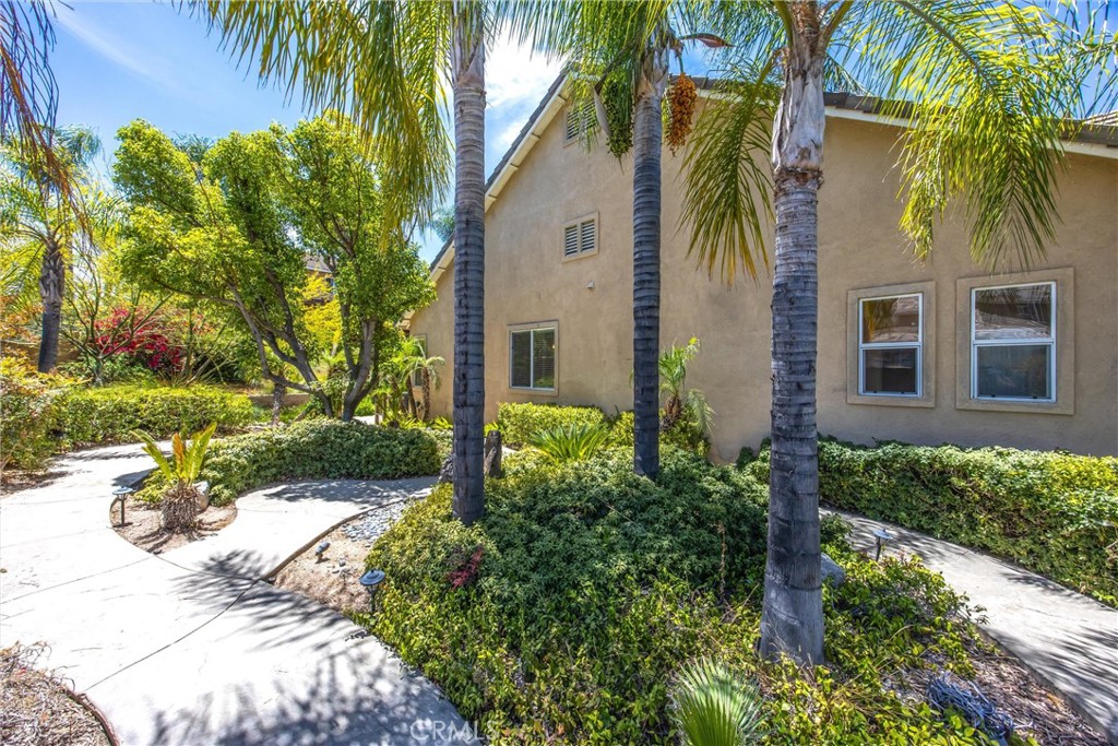 8710 Windmill Place Riverside, CA 92508 - Photo 58 of 66 a front view of a house with a yard