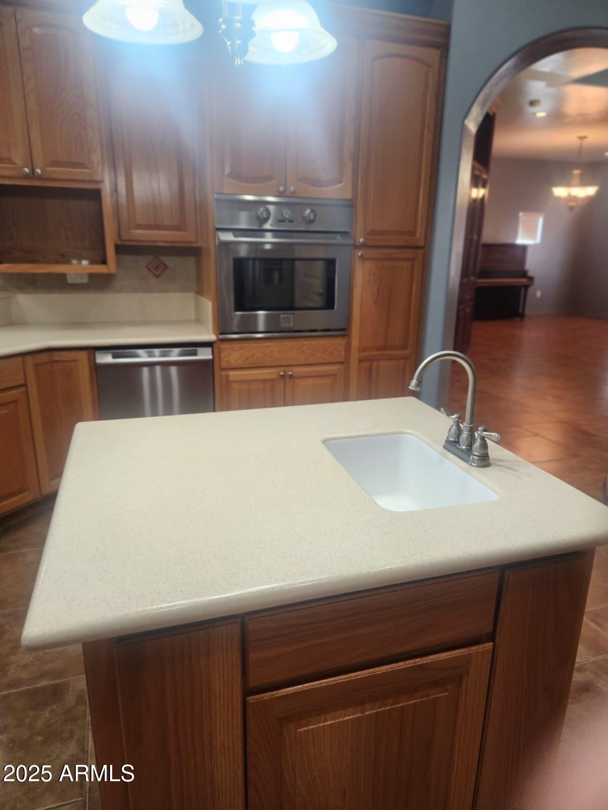 1766 East Golf Course Road Douglas, AZ 85607 - Photo 12 of 29 a bathroom with a sink and a mirror