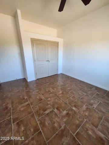 a view of empty room with windows