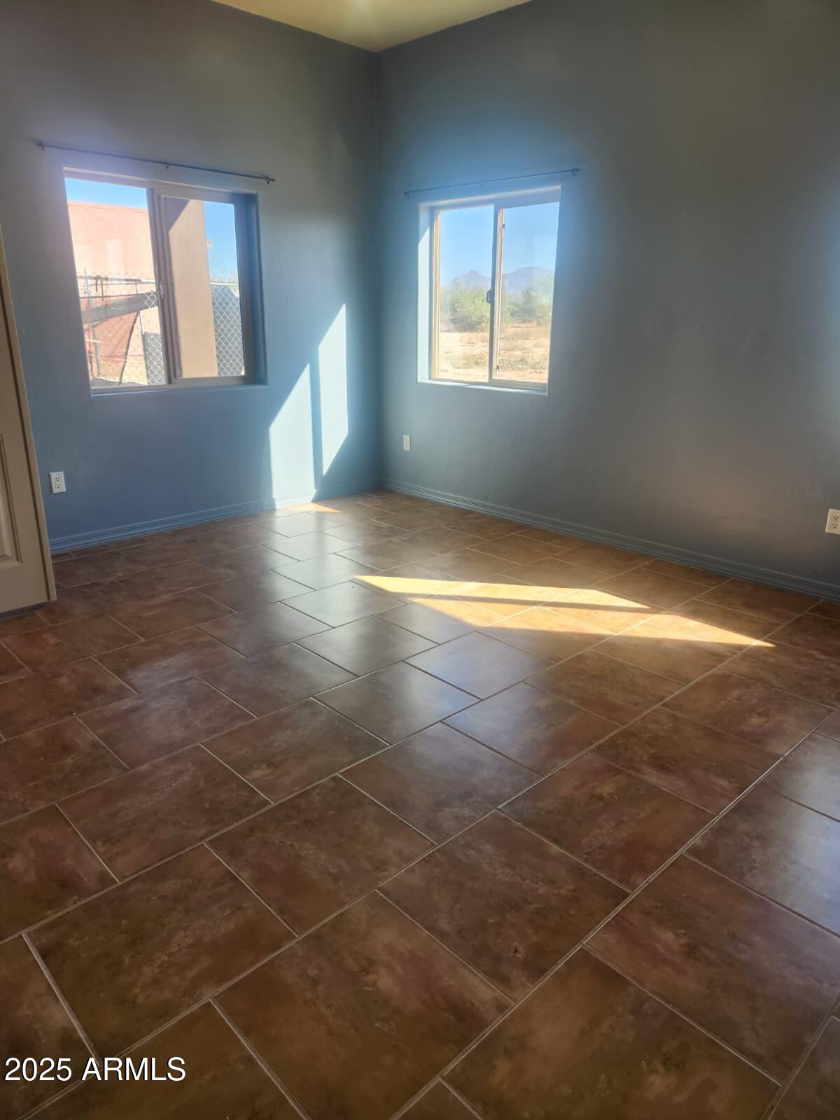 1766 East Golf Course Road Douglas, AZ 85607 - Photo 21 of 29 a view of empty room with windows