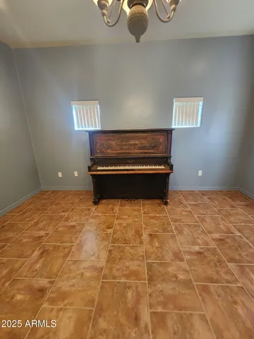 a large bathroom with a large tub and sink