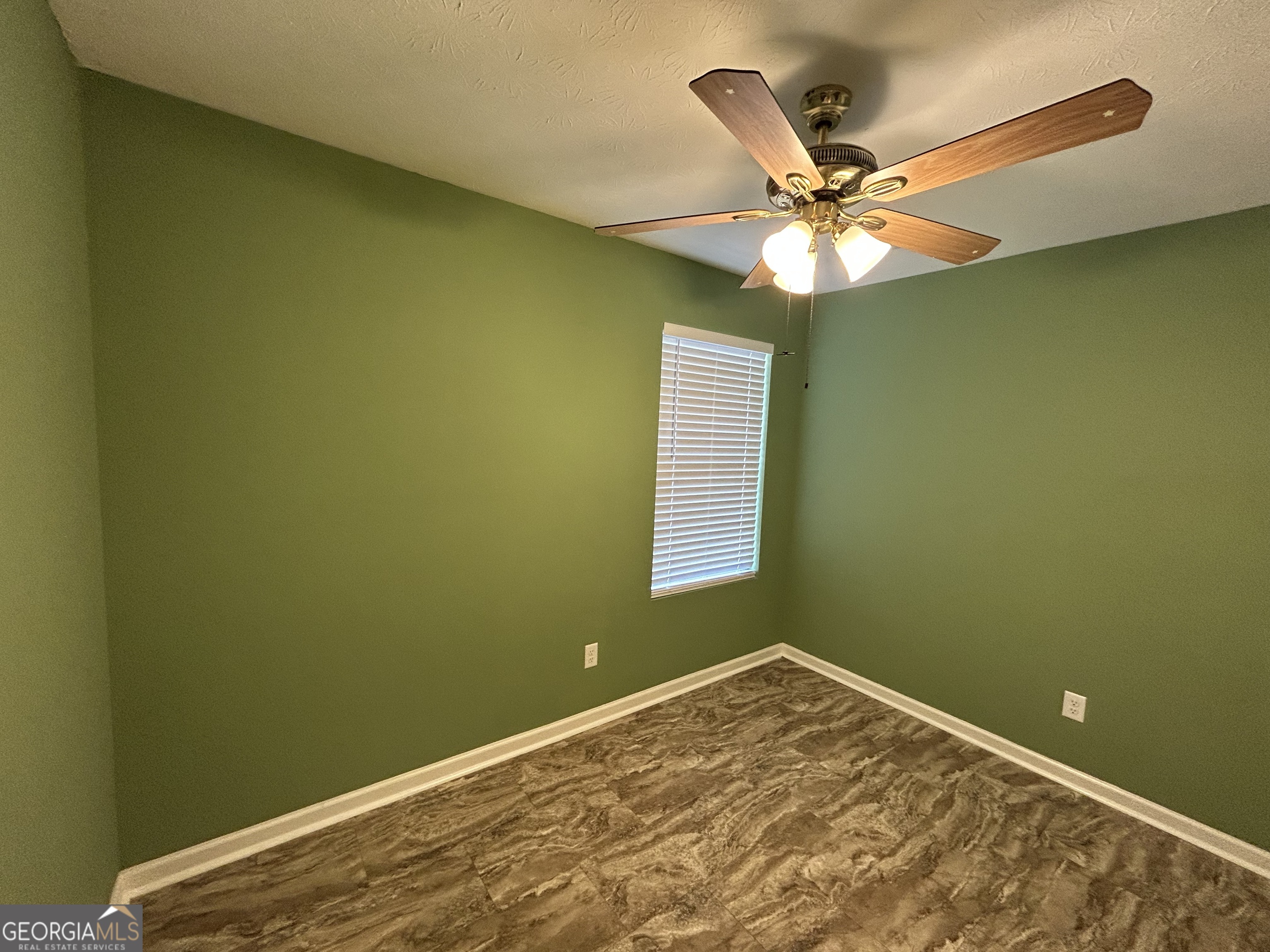 206 Ann Murphy Road West Point, GA 31833 - Photo 20 of 57 a view of a room with a ceiling fan and a window