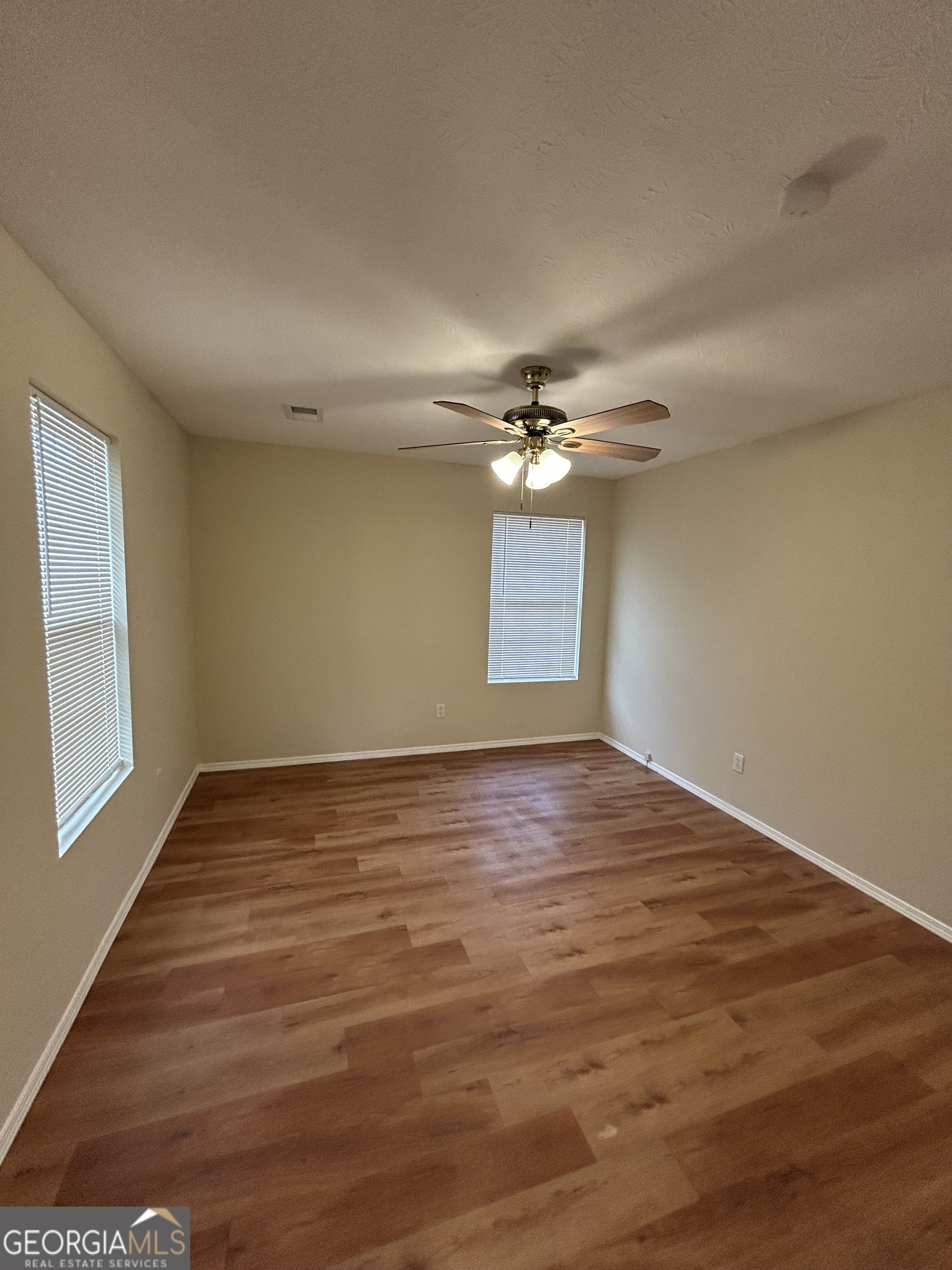 206 Ann Murphy Road West Point, GA 31833 - Photo 27 of 57 wooden floor in an empty room with a window