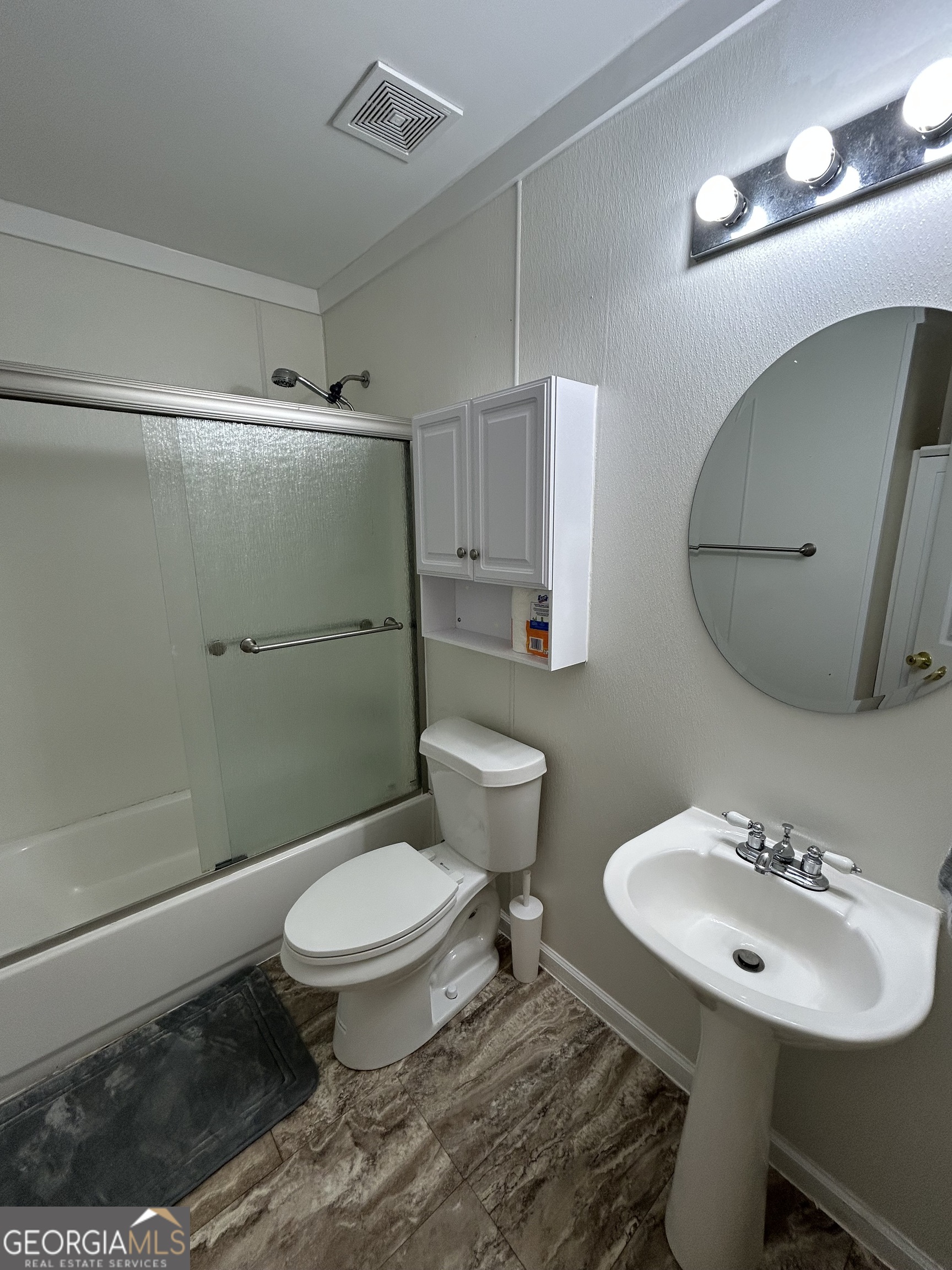 206 Ann Murphy Road West Point, GA 31833 - Photo 32 of 57 a bathroom with a sink toilet and a mirror