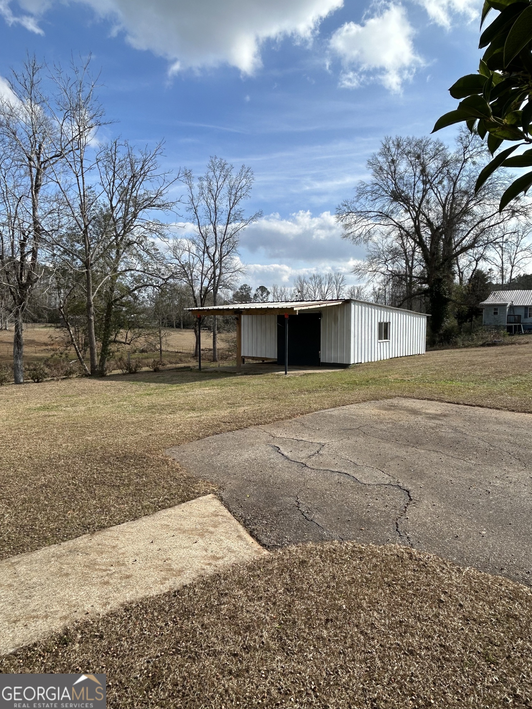 206 Ann Murphy Road West Point, GA 31833 - Photo 36 of 57 a view of backyard with large trees