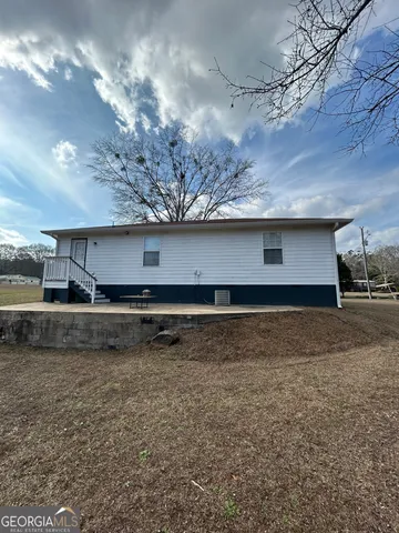 a view of room with a fireplace
