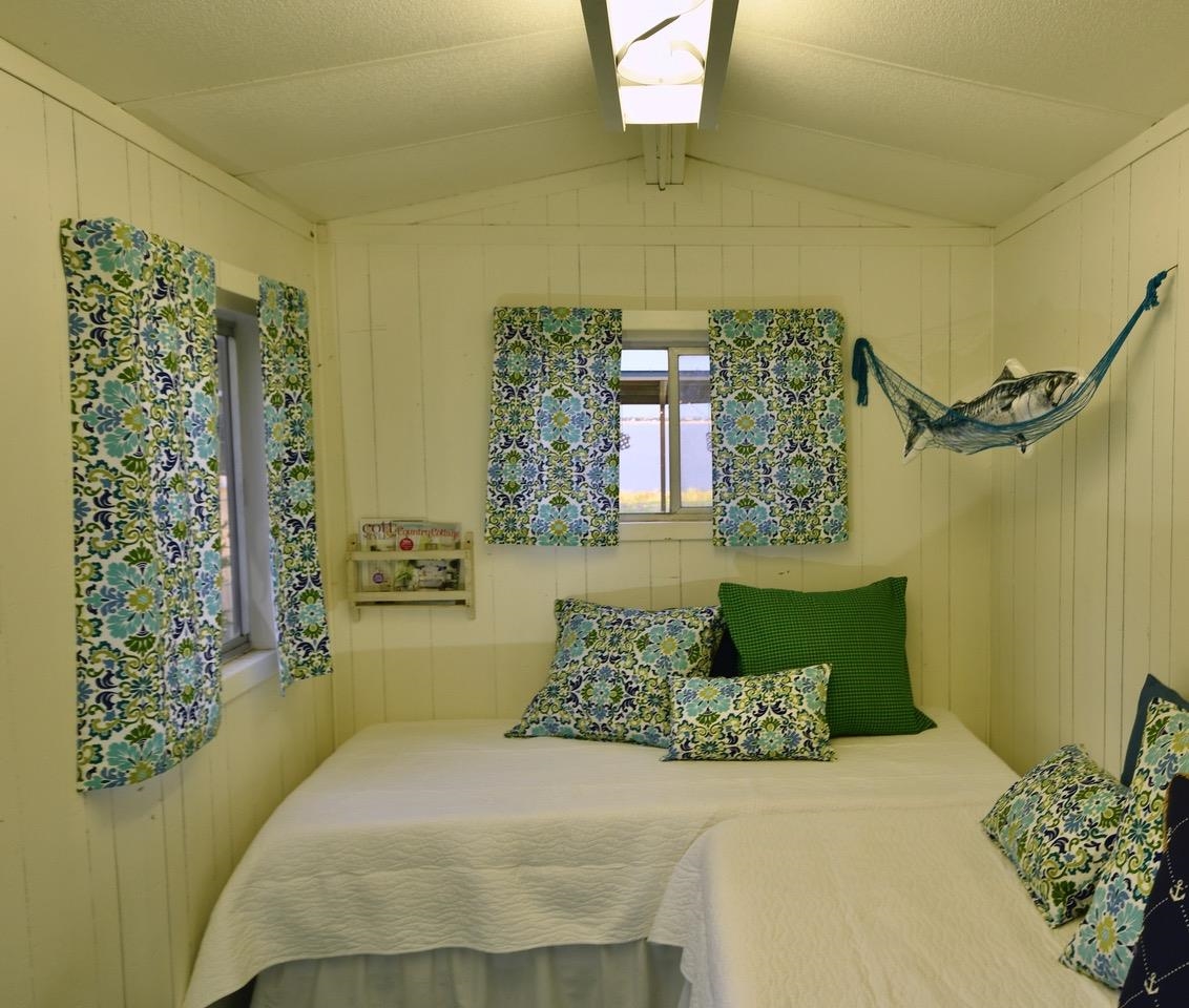 809 Lakeshore Loop Tow, TX 78672 - Photo 28 of 33 a bedroom with a bed and a window