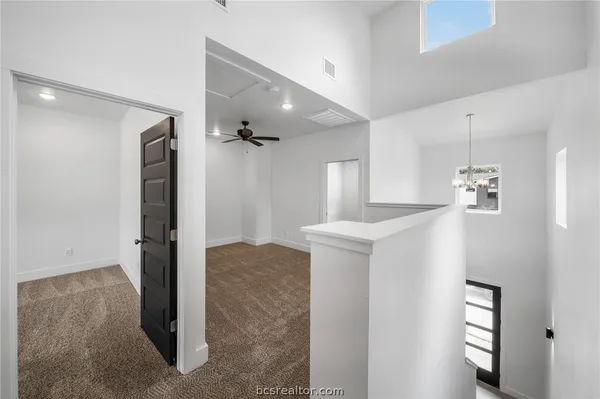 a view of livingroom with hardwood floor and hallway