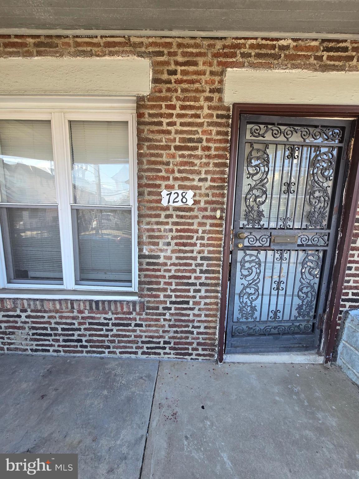 728 South 59th Street Philadelphia, PA 19143 - Photo 1 of 38 a view of front door of house