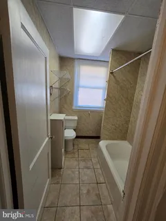 a bathroom with a sink and a tub
