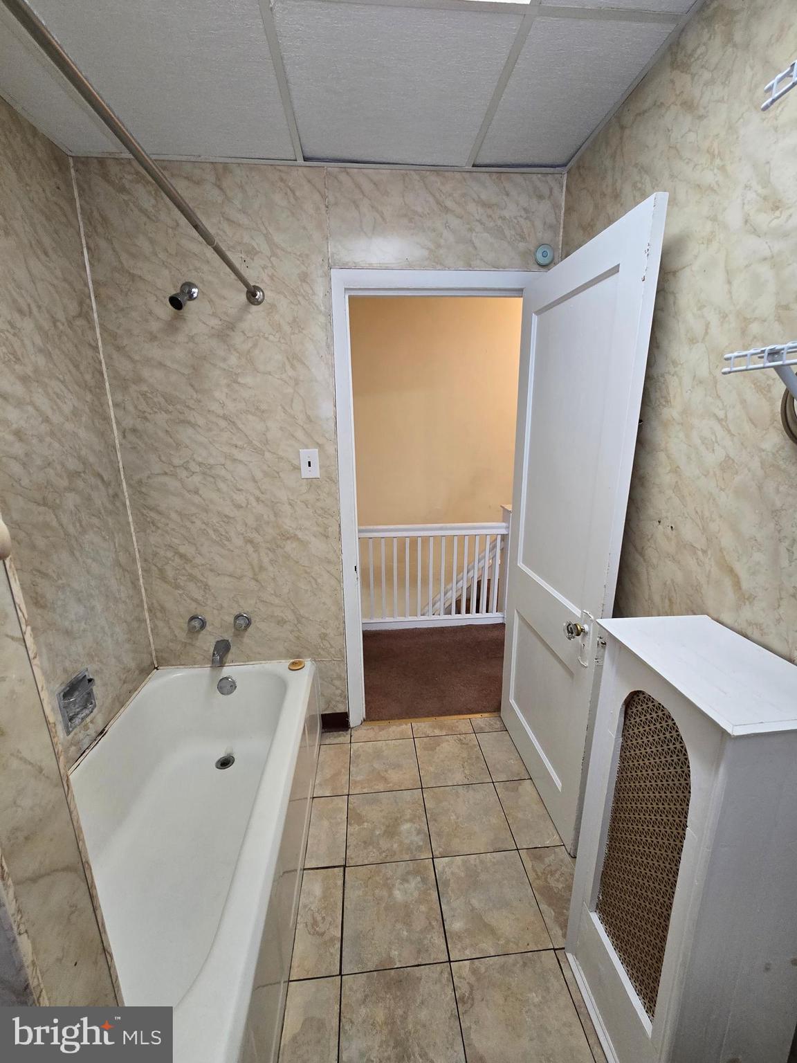 728 South 59th Street Philadelphia, PA 19143 - Photo 28 of 38 a bathroom with a bathtub and a shower