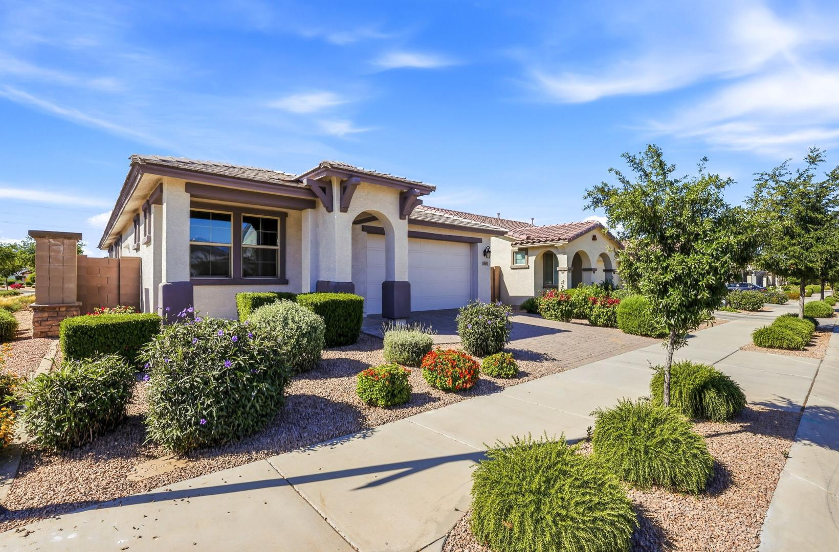 20437 East Estrella Road Queen Creek, AZ 85142 - Photo 2 of 33 a front view of a house with garden