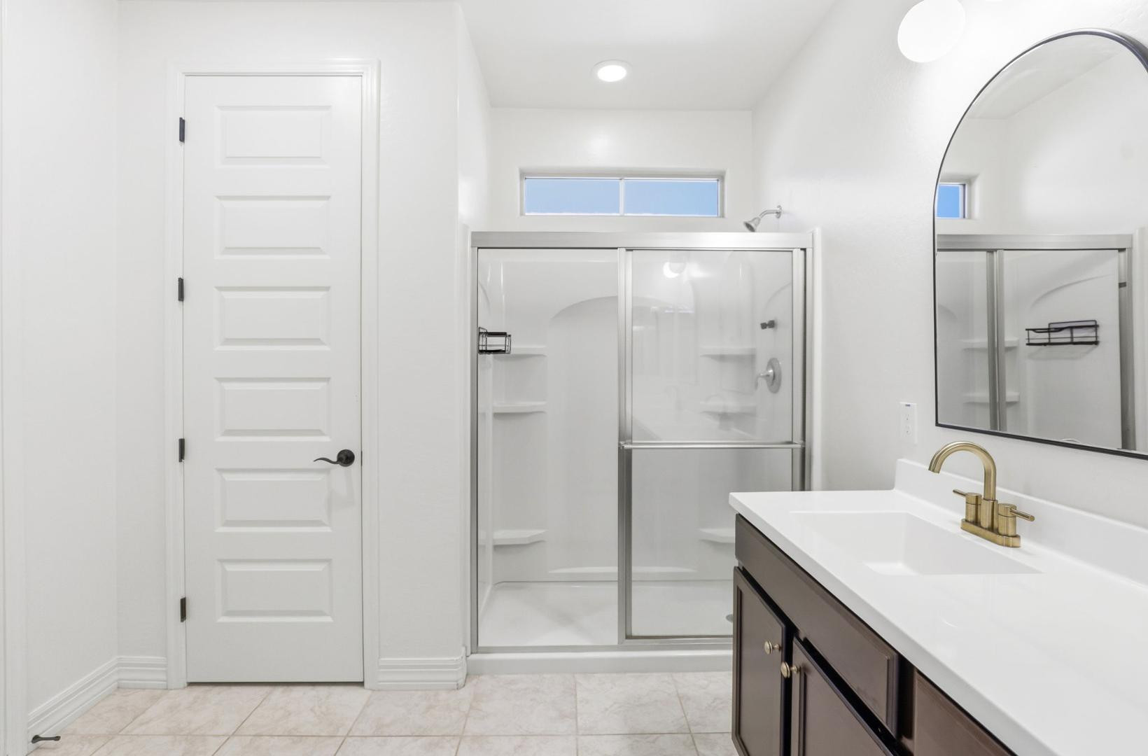 20437 East Estrella Road Queen Creek, AZ 85142 - Photo 26 of 33 a bathroom with a sink and a mirror