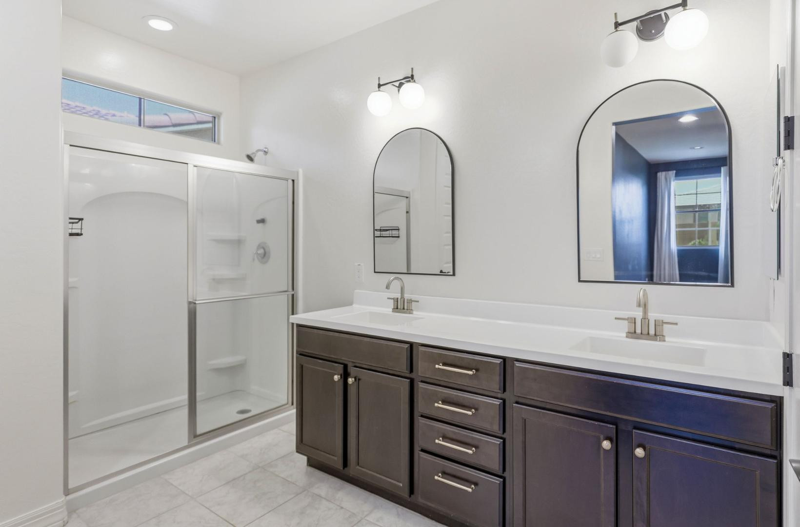 20437 East Estrella Road Queen Creek, AZ 85142 - Photo 28 of 33 a bathroom with double sink and a mirror