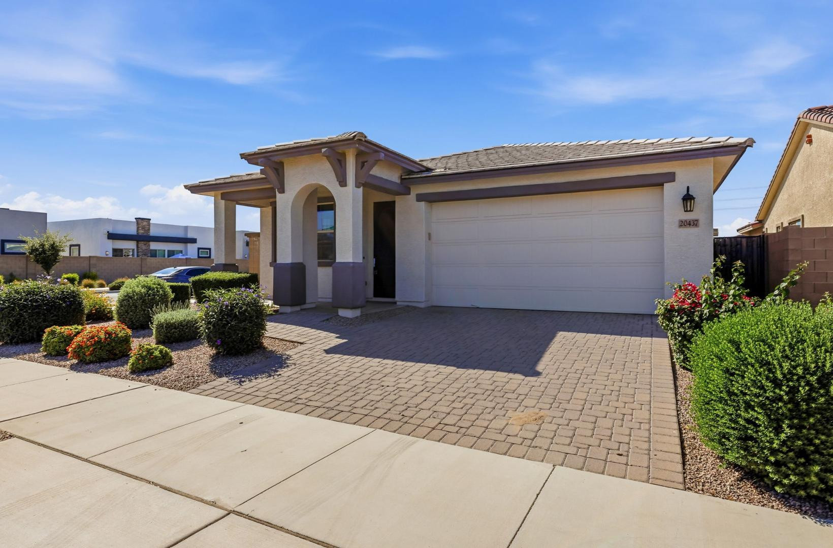 20437 East Estrella Road Queen Creek, AZ 85142 - Photo 3 of 33 a front view of a house with patio