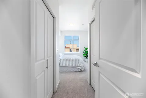 a view of a bedroom from a hallway