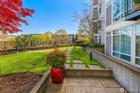a view of a pathway with a yard