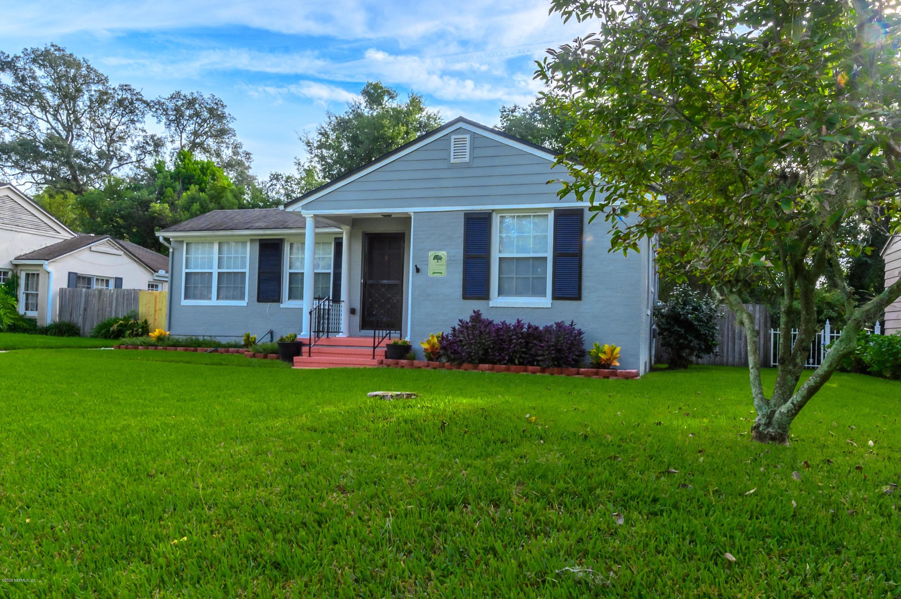 1505 Nicholson Road Jacksonville, FL 32207 - Photo 1 of 41 a front view of a house with a garden