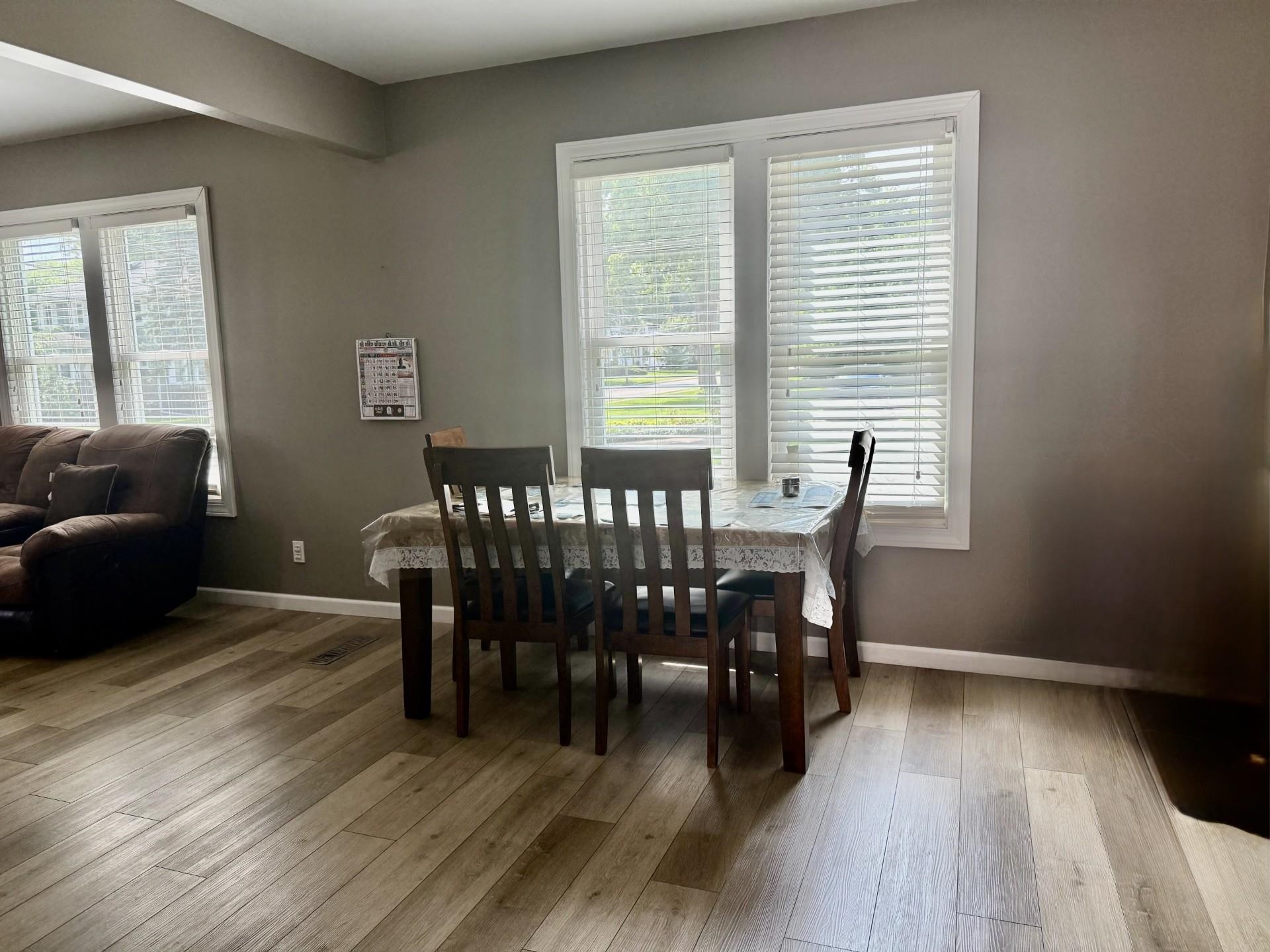 2731 7th Street Peru, IL 61354 - Photo 11 of 25 a view of a dining room with furniture window and wooden floor